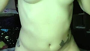 The alt pawg starts masturbating with vibrator and toys, building to orgasm