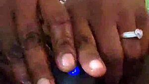 ebony self pleases her ass with toys