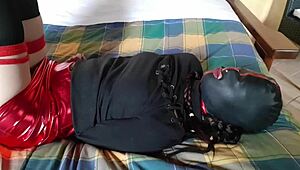 hogtied, blindfolded, sucking fat cock?
