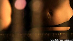 Watch this erotic brunette milf rip her clothes and dance nude!