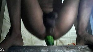 Horny gay says, 'fuck my pussy with that cucumber'