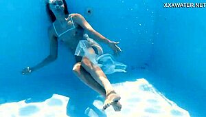 Ivi Rein's natural tits and tight pussy underwater adventure.