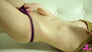 Liz says, 'Watch me stimulate my clit on the sofa'