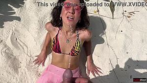 Skinny teen beauty pees on Maldives beach with golden shower twist