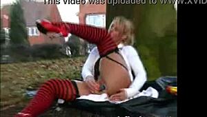 Slutty British amateur flashes her small tits in public