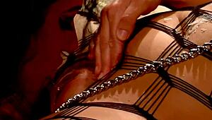 Glamcore lesbian pours hot wax on dyke girlfriend before licking her pussy