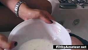 Depraved whore takes milk demijohn up her ass!