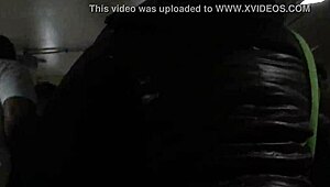 Spying on a chubby girl touching her brown nylon jacket on the street