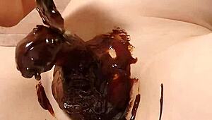 Japanese gay couple cooking chocolate banana in steamy scene