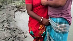 Indian couple gets wild with Bowdi bent over for hard fucking by the river.