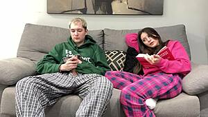 step brother jerks off to porn beside step sister, but she grabs his cock for a handjob instead