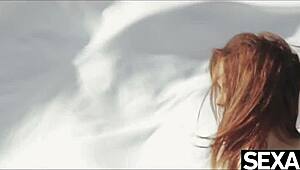 Two Hot Redheads Dive into Wild Lesbian Sex on Public Beach