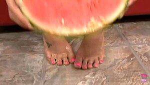 Amazing brunette squishes melon with feet, then gets fucked doggy style