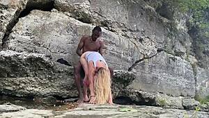 Bigdaddykj and his interracial couple enjoy outdoor fucking on a hike, their big black cocks dominating the scene
