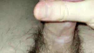 Young twink jerks off in homemade video.