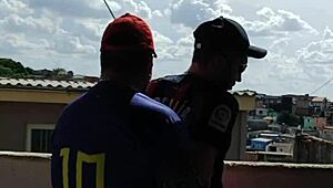 tbt eating young guy outdoors with audience watching.