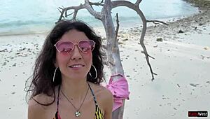 Golden shower for Katty right on the public beach