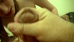 a hot redhead babe with small tits deepthroats cock in pov cumshot scene