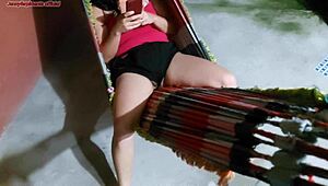 Stepmother distracted, not noticing her swollen pussy slipping out of shorts while on the hammock, driving me wild with desire.