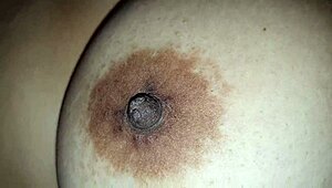 Squeezing Step-Mom's Big Nipples