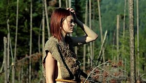 Hey, check out this naked girl masturbating in the forest! 😍