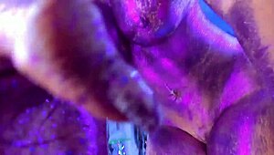 Watch this curvy latina twerk with glitter and oil on her naked body.