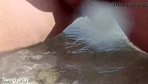 Curvy wife shaves smooth before peeing openly on a public beach