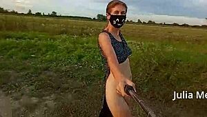 Juli Smith Undresses in the Field