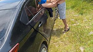 The wife bends over in the car, showing her big ass to strangers for a public fuck