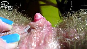 Sticky Hairy Pussy with a Huge Clit in Close-Up Action