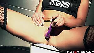 Eurobabe enjoys solo fingering with toys in bathroom