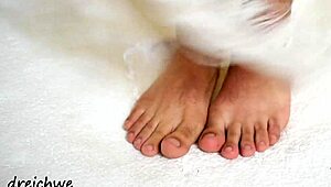 the sexy gay man shows off his huge high definition feet