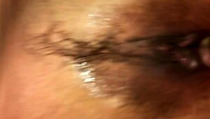 Amateur woman fingers her clit and pussy until she squirts in this homemade masturbation session