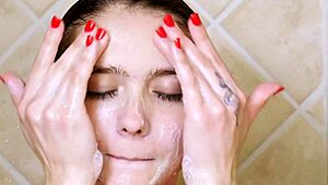 Charming Brunette Model Strips and Showers for Photoshoot