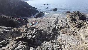 Damn, exhibitionist flashes dick to nudist milf, gets sucked on beach!