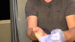 Flexible guy masturbates with plug