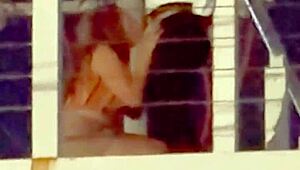 Couple enjoying intimacy on the bridge