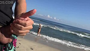 Two unknown girls catch me masturbating on the beach. I invite them to help with my cock!