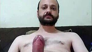 Cute Redhead Strokes Cock Solo for Facial Cumshot