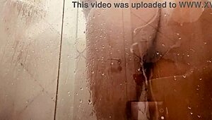 milf films herself cleaning hairy pussy in steamy bathroom