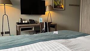 Stepmother Shares Hotel Bed with Young Guy