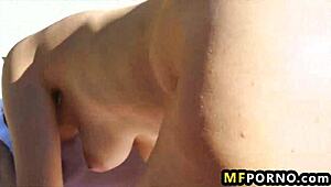 nadia noel sunbathes and fingers her shaved pussy alone, using toys for fun