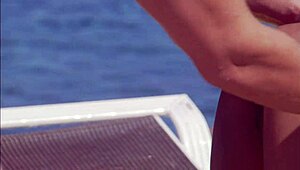 Dee gets massaged and fucked hard by pool outdoors