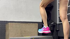 another day at the gym with this brunette bodybuilder getting wet and working out hard.