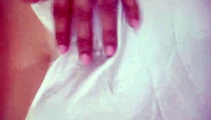 Hot milf teases with solo fingering of her wet pussy in steamy lingerie