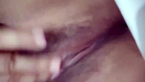 Hot milf teases with solo fingering of her wet pussy in steamy lingerie