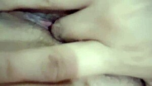 Hot milf teases with solo fingering of her wet pussy in steamy lingerie