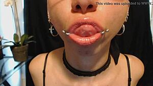 Drooling over nude lipstick with wet tongue