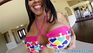 Tittyfucked beauty strokes huge cock in close-up POV for cum splash