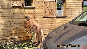 Bikini milf washes car, plays naked with foam on tits